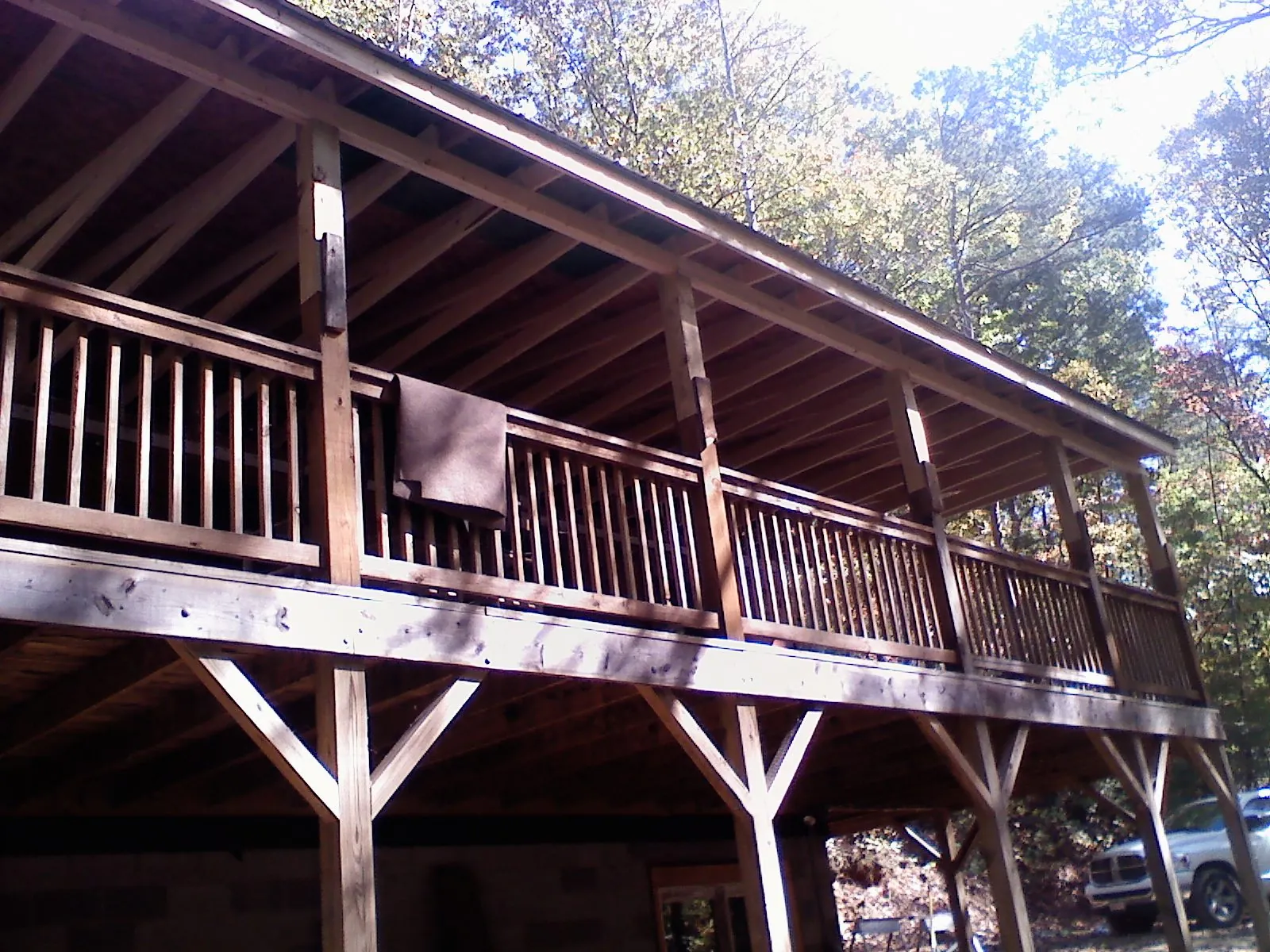 Timber framing under a new elevated porch and deck — Roof Leak Repair in Fort Smith by Roofing Brothers